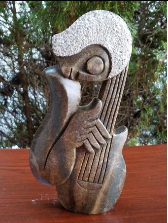 Hand-carved Serpentine Stone Guitarist Sculpture