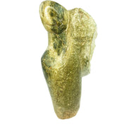 A sculpture of a man and a woman embracing, hand-carved in green stone.