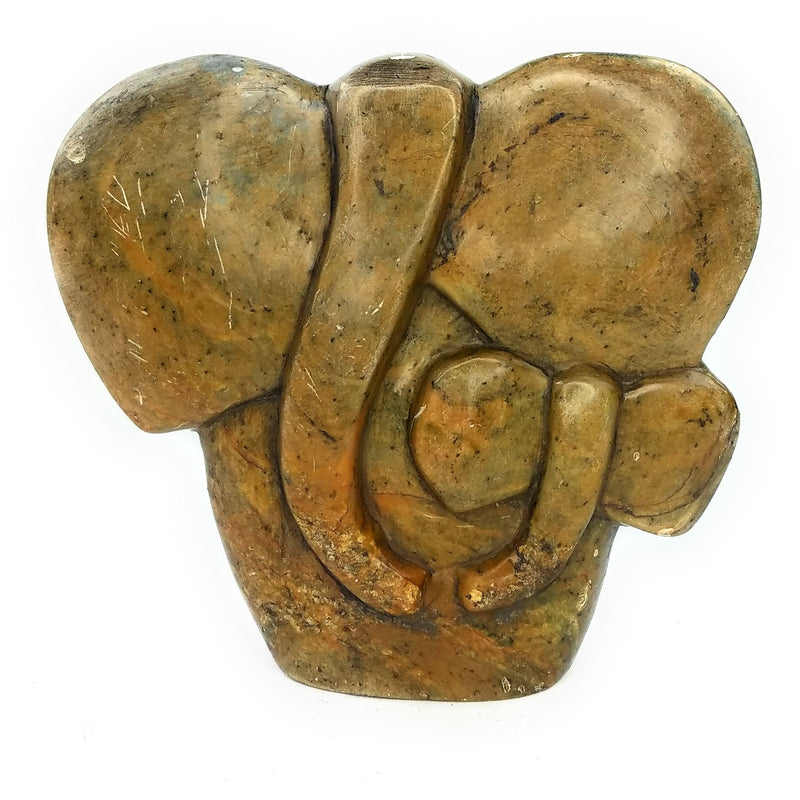 Hand-carved stone sculpture of an elephant mother and child, with a natural, rustic finish.