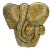 Hand-carved stone sculpture of an elephant mother and child, in various shades of brown and beige, with a textured surface.