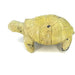 A hand-carved stone turtle figurine with a natural beige and brown coloring.