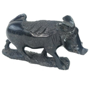 A serpentine stone warthog hand-carved sculpture originating from Zimbabwe.