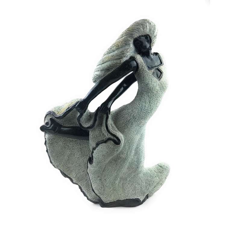 Beautiful Woman Holding Dress – Hand Carved Shona Springstone Sculpture