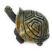 A hand-carved stone turtle sculpture in various shades of green and brown.