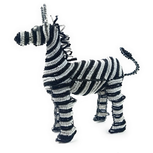 A handcrafted bead sculpture of a zebra with black and white stripes, made by Shona artisans in Zimbabwe, South Africa.