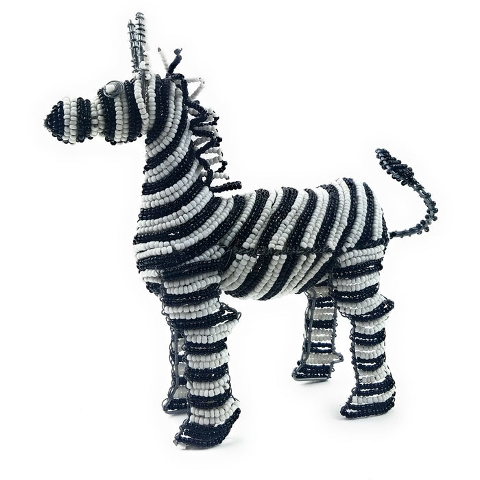 A handcrafted bead sculpture of a zebra with black and white stripes, made by Shona artisans in Zimbabwe, South Africa.