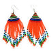 A pair of colorful bead earrings with a mix of orange, green, blue, and red beads, handcrafted.