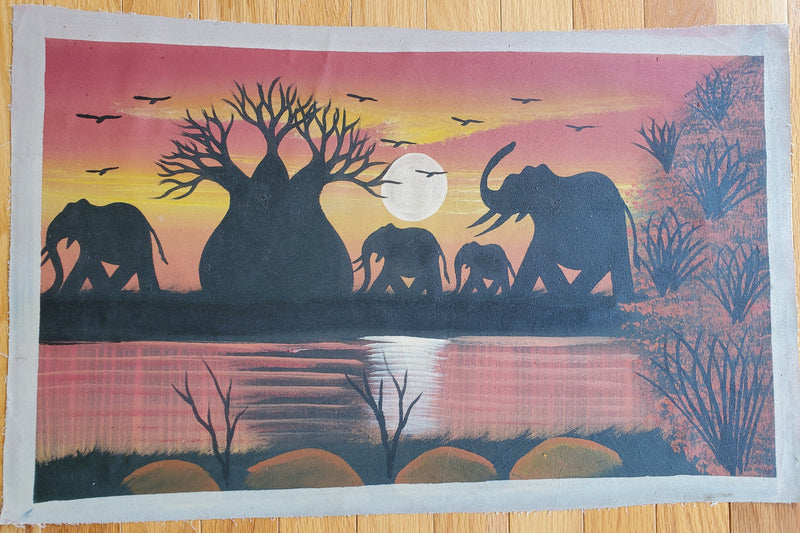 A canvas painting featuring silhouettes of four elephants in a sunset setting with a baobab tree and vegetation, painted in various colors.