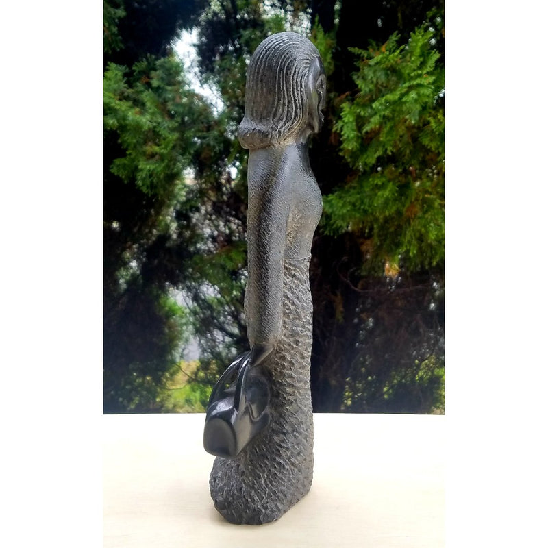Professional Woman Sculpture – Hand Carved Shona Springstone from Zimbabwe