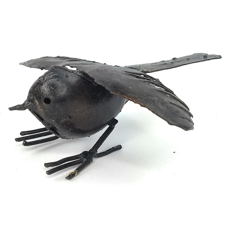 A black recycled metal bird sculpture with outstretched wings, handcrafted and varnished, posed with a slightly open mouth.