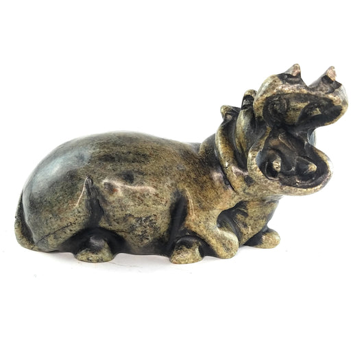 A hand-carved serpentine stone sculpture of a hippo, with a textured green finish.