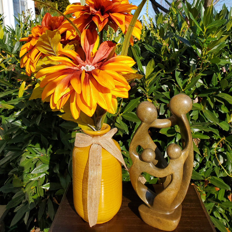 Ukama Family of 4 Brown Serpentine Sculpture 11”